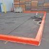 Dique permanente para protección de derrames